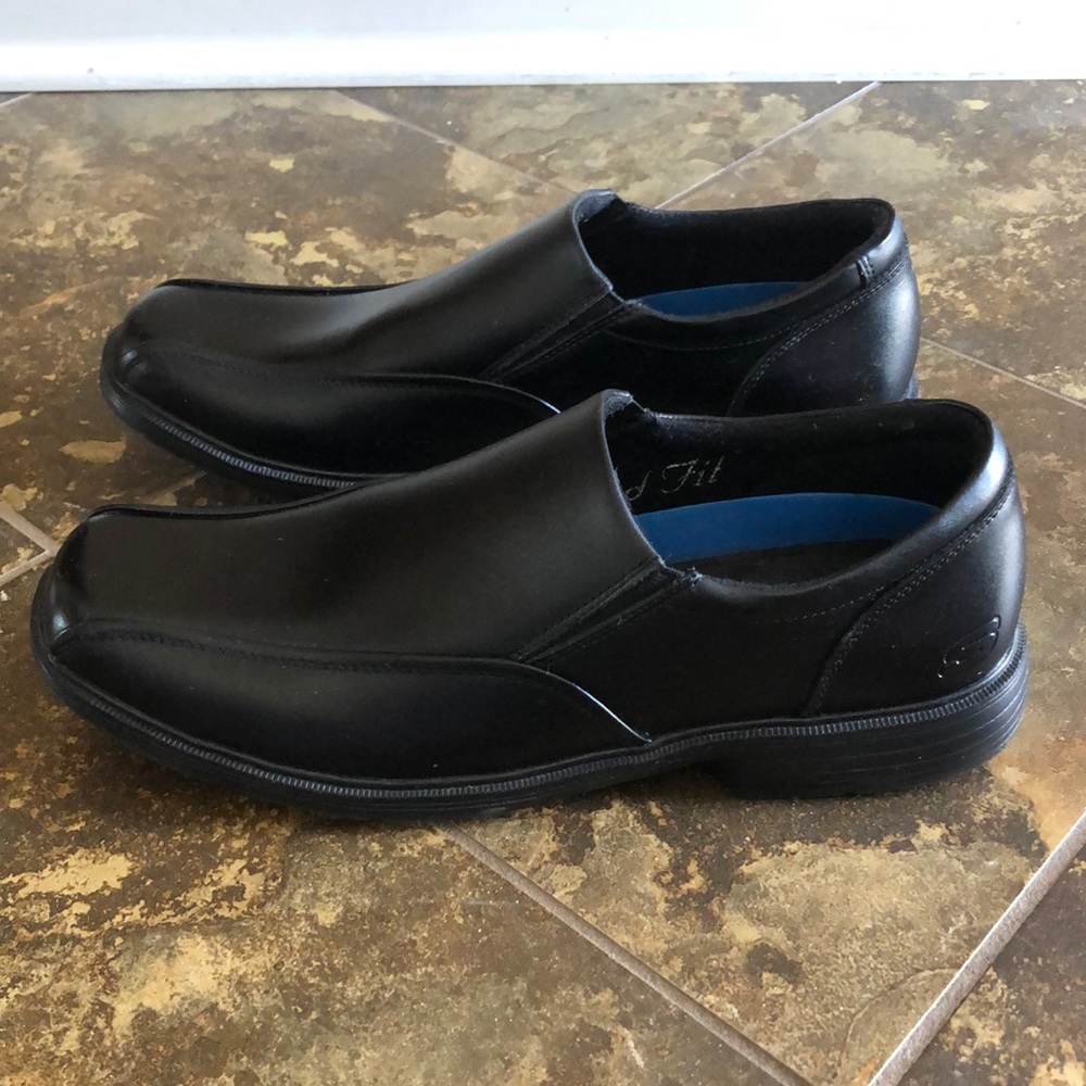 Sketchers Black Leather Slip On